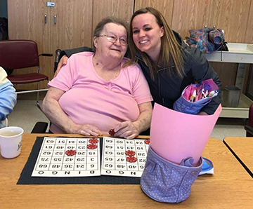 2 girls helping with easter baskets