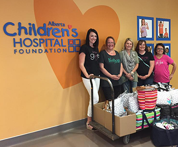 Many women holding easter baskets