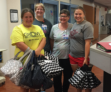 Julie Miller helping out